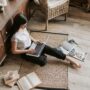 Photo by Vlada Karpovich: https://www.pexels.com/photo/confident-young-businesswoman-with-laptop-and-notebook-sitting-on-floor-modern-apartment-4050351/